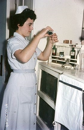 Nurse Peters measuring medicine B3 Ward BMH Iserlohn