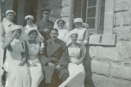 group photo nurses doctors great war uniforms aprons veils greatcoat