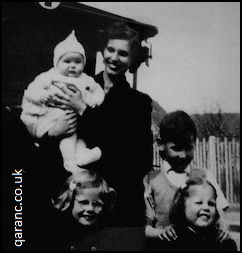 Leggetts family in front British military ambulance 1954