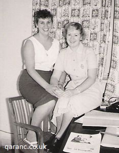 Two Nurses In Bedroom