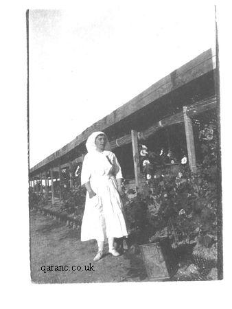 QAIMNS Nurse Tending To The Hospital Garden